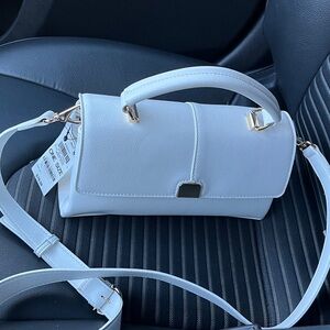 Stylish White Crossbody Bag with Gold Accents